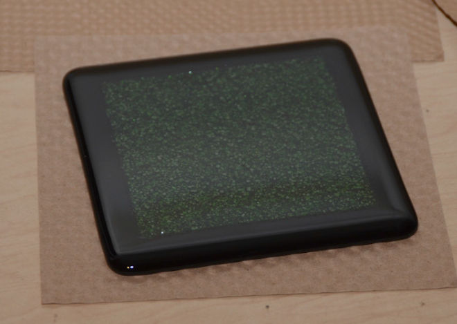 Green square piece fused